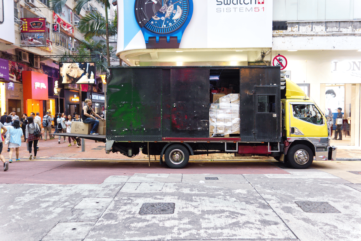 trucker sitting in a retail district, Hong Kong